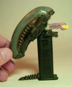 Alien Pez Dispenser Destroys Your Childhood… In the Best Way