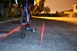 A bicycle lane laser tail light for rides at night
