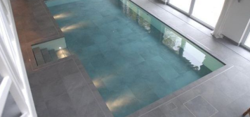Movable floors that turn into swimming pools