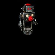 A 3 foot tall robot lamp sculpture made from recycled materials