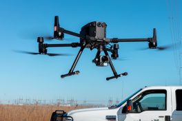 Watch quadrocopters throw a stick and balance it on their heads